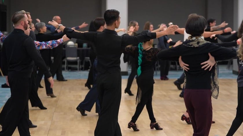 Dancers from all ages dancing on dancefloor for a dance workshop