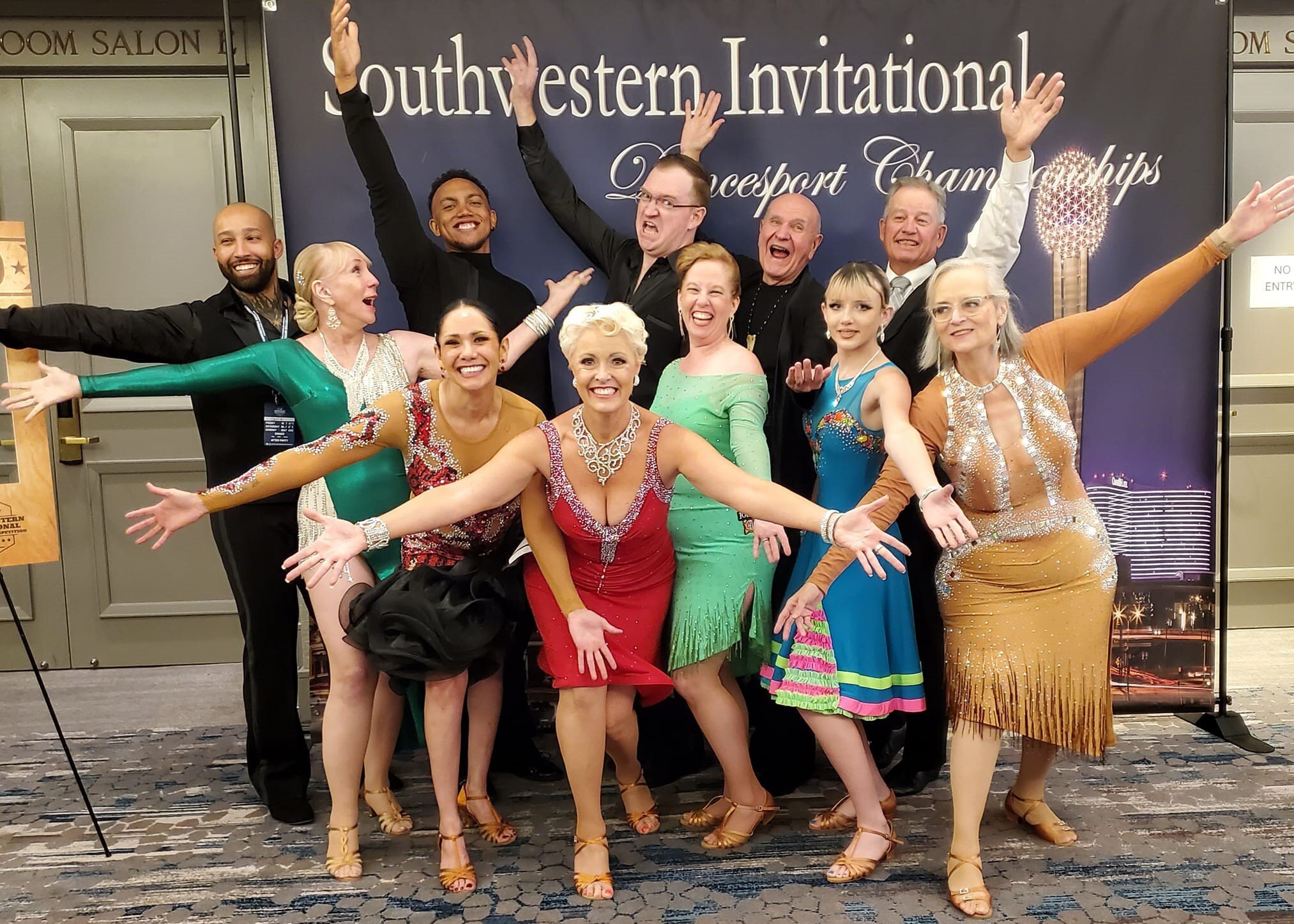 performers at the event's backdrop